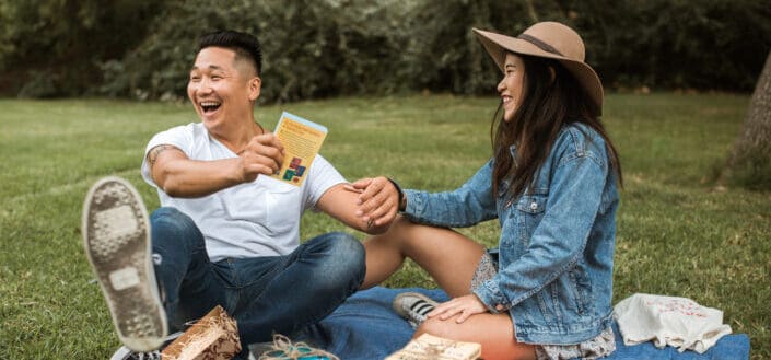 couple laughing on their picnic