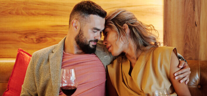 A loving couple drinking wine