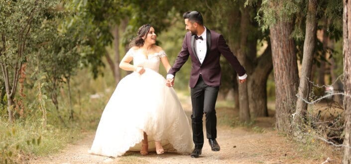 Bride and groom walking on a pathway