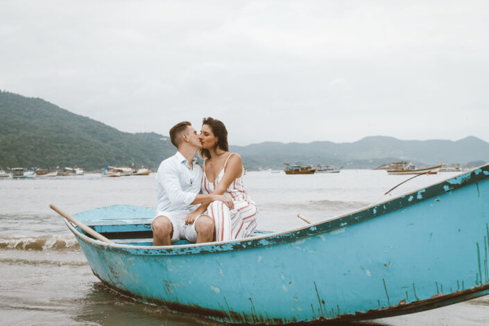 Couple kissing on boat