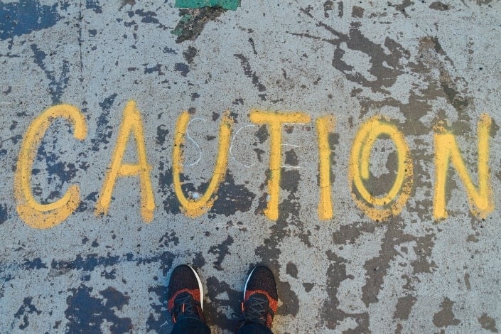Caution painted in the ground